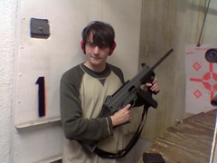 Simon Willison holding an HK-45 assault rifle